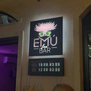 Emú Bar sign in the dark