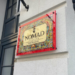 Nomad Studios sign side profile Nomad Studios sign side profile
