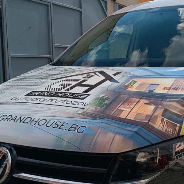 Branded front hood of a Grand House vehicle Branded front hood of a Grand House vehicle
